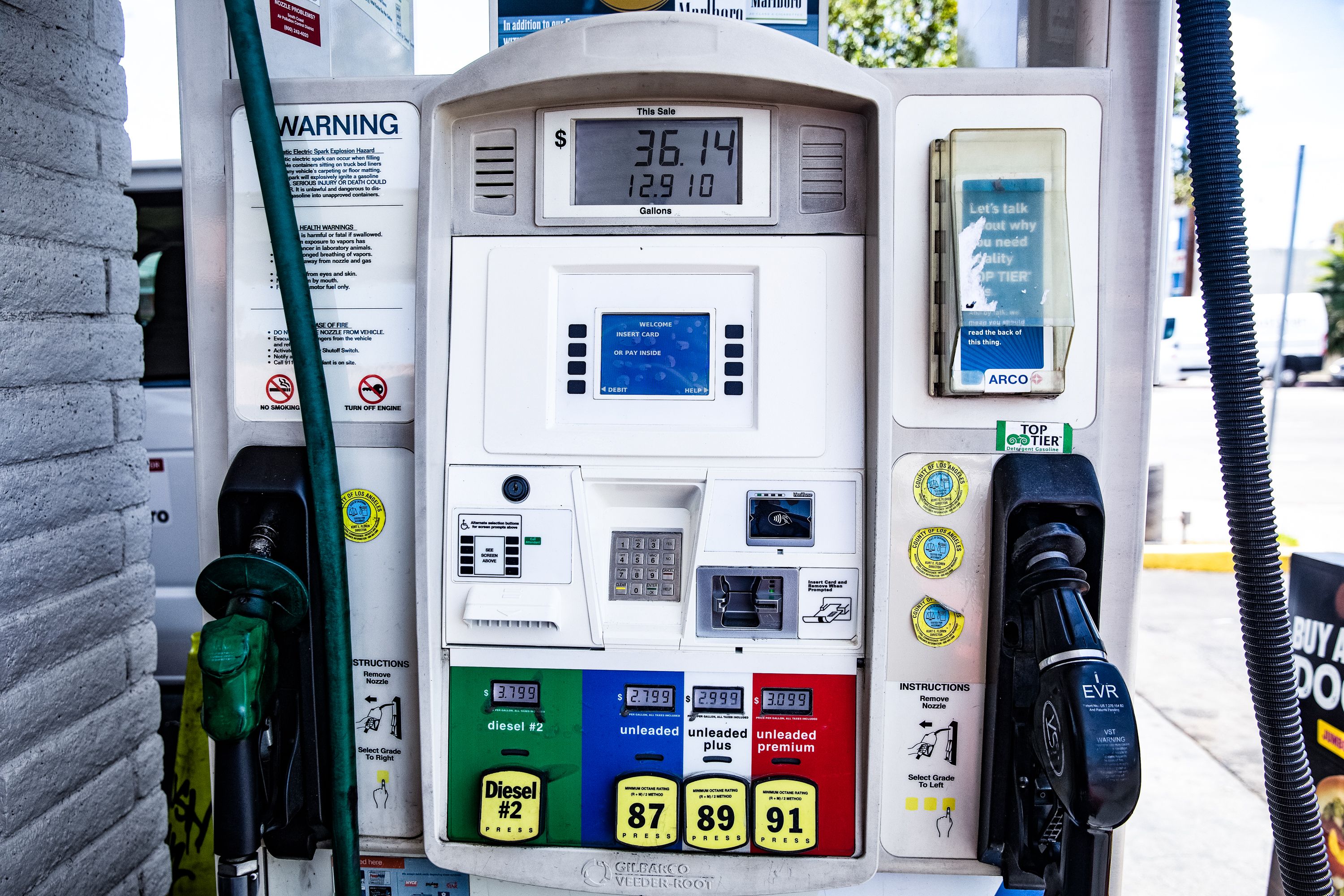 Close-up of a fuel pump showing gasoline and diesel prices at a gas station, a pocketbook issue for voters.